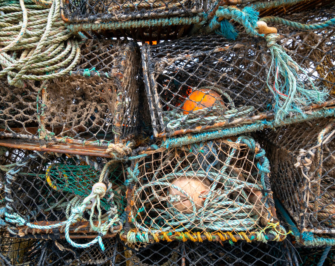 boat photography of lobster pots in a harbour