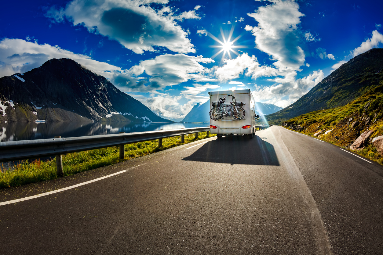 What is the speed limit for a car towing a caravan? Caravan on sunny road