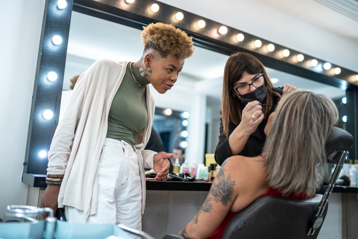 Lady being taught to do eyebrows