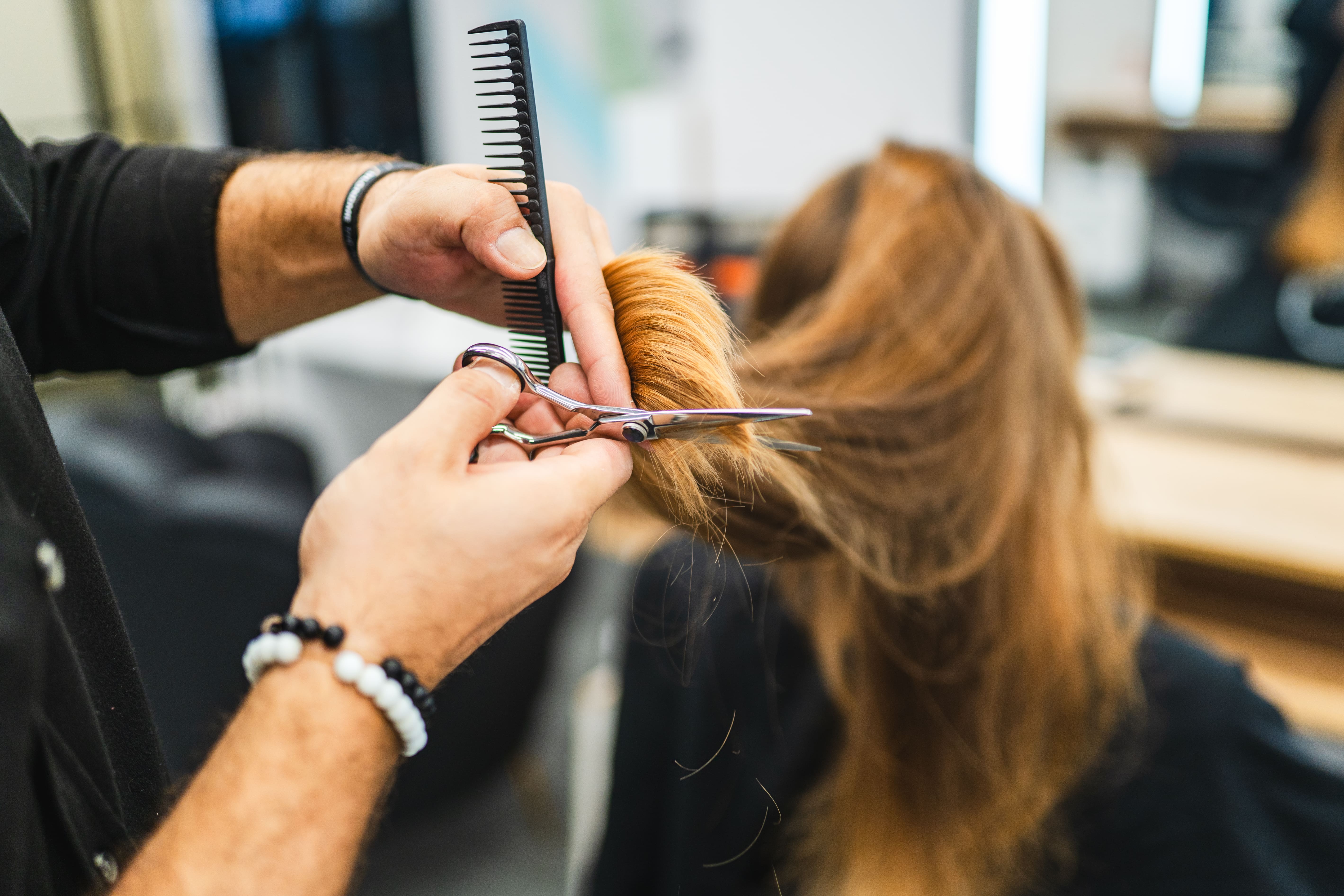 cutting hair in a salon