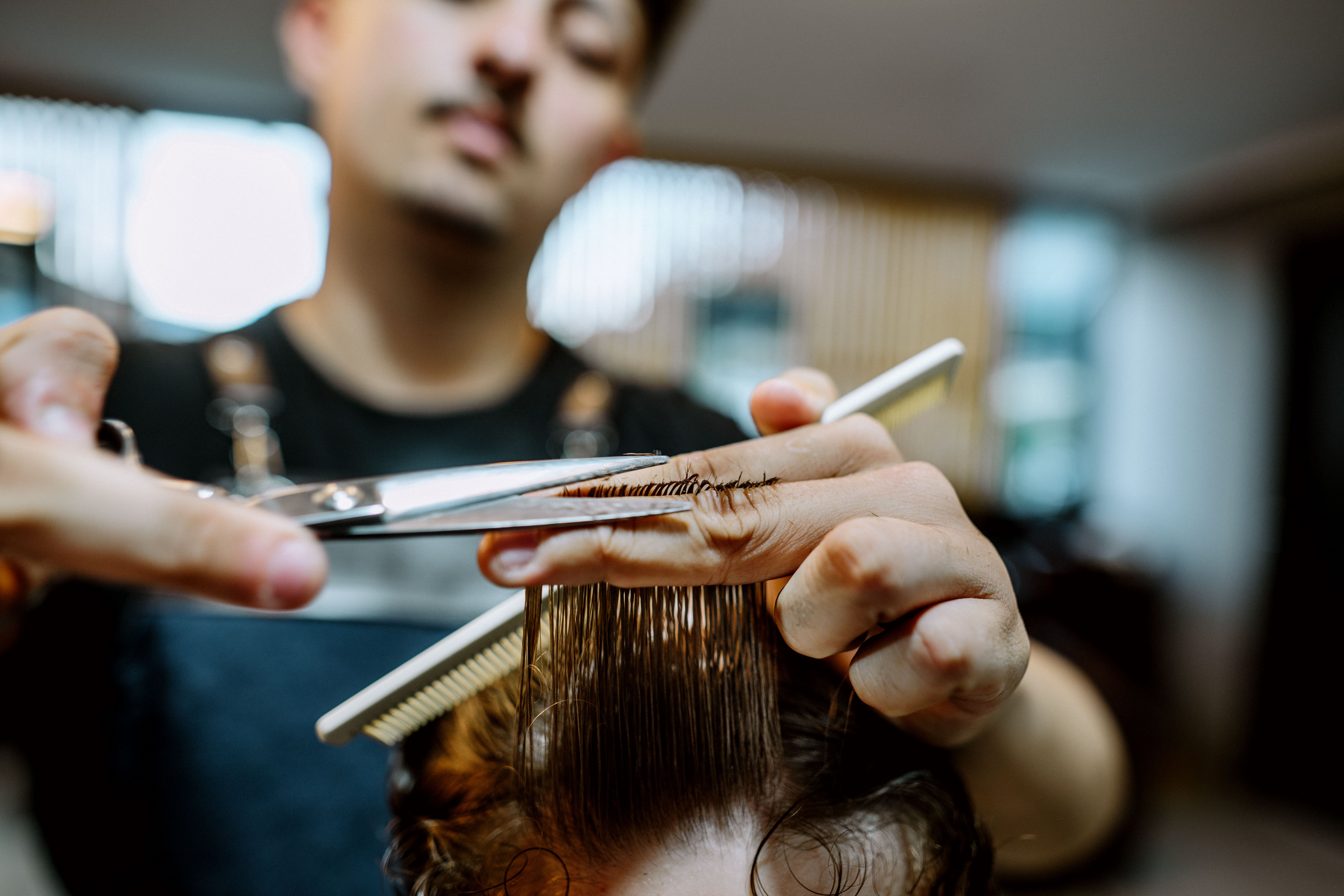 cutting hair in a salon