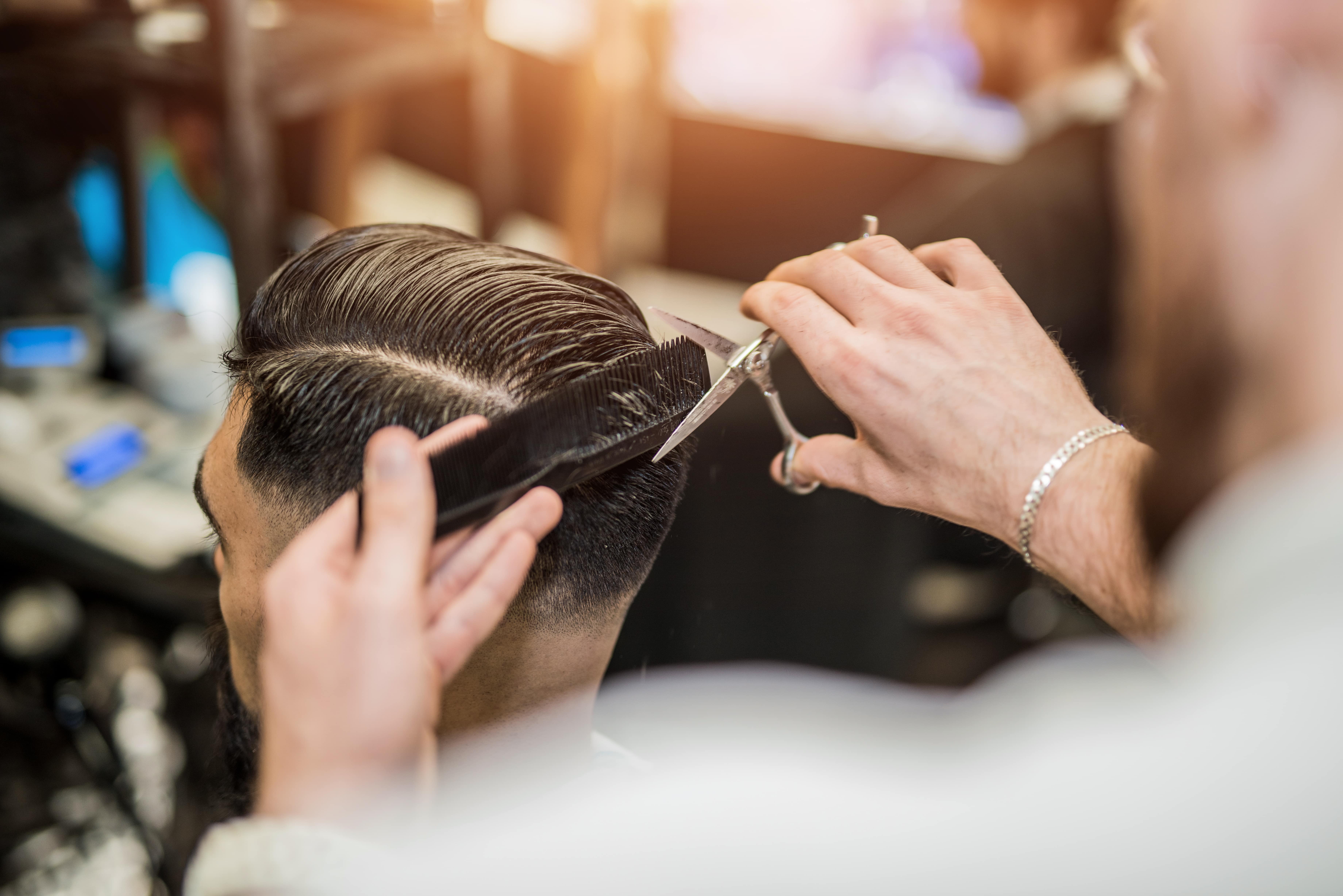 cutting hair in a salon